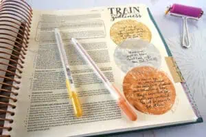 1 Timothy 4:7-8 Bible journaling page with paint and gel pens