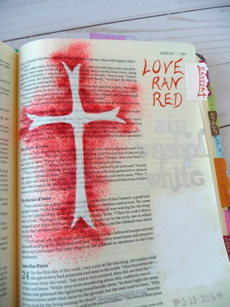 Bible journal with red spray ink