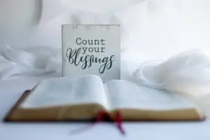 count your blessings sign and Bible